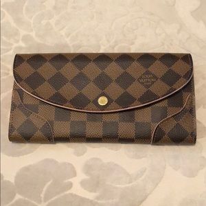 Louis Vuitton wallet only used a handful of times.